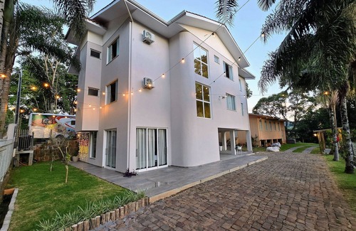 Piratuba House | Casa das Palmeiras