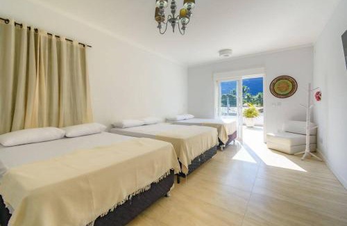 Praia de Barequecaba House | Casa de alto padrão, com 5 suítes, a 50m praia de Barequeçaba