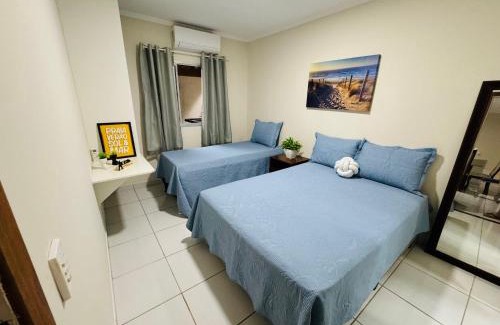 Praia do Morro Apartment | Casa de Praia com Piscina, quintal, lazer e churrasco, 3 quartos com ar condicionado, sendo 2 suites para sua familia!