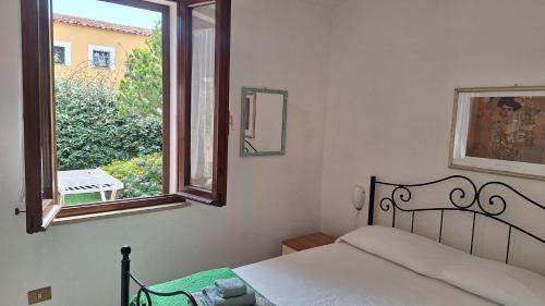 Porto Pollo Apartment | Casa di Lu' - Bilocale con giardino - Porto Pollo