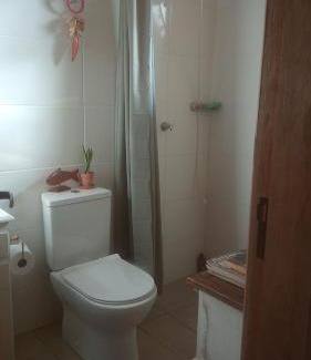 Rio Vermelho Norte House | Casa dos fundos com estacionamento