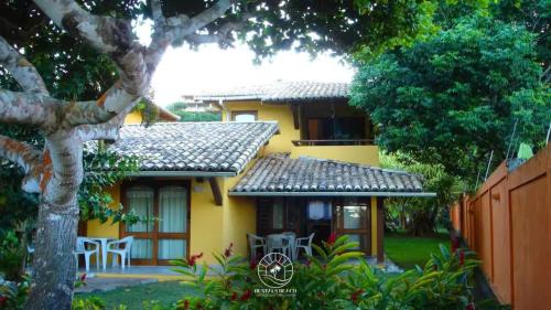Arraial d'Ajuda House | Casa em Arraial D'ajuda - Praia do Mucugê - Bahia - 40mts da praia - Ar condicionado - Churrasqueira - Smart Tv - Wifi - Piscina - Vaga para carro