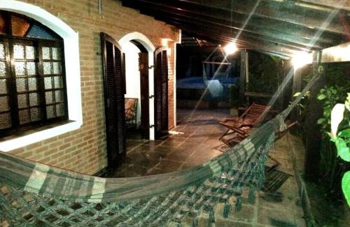 Morada da Praia House | Casa em Bertioga no Cond Morada da Praia com piscina