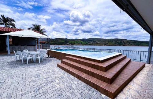 Capitolio House | Casa em Capitólio com piscina e vista para lago | W1
