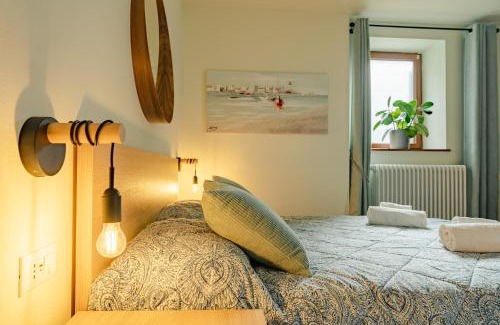 Assenza Apartment | Casa Galya with private patio by GardaDoma