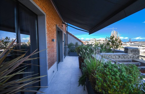 el Camp d'en Grassot i Gracia Nova Apartment | Casa Hercules by Luxe Haus - Penthouse Eixample With View of La Sagrada Familia