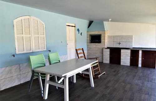 Palhoca House | Casa na praia da Pinheira
