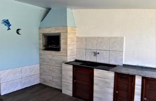 Palhoca House | Casa na praia da Pinheira