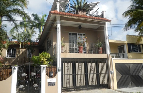 Colonos Cuzamil House | CASA OKLAHOMA in Cozumel Mexico is beautiful, private oasis 3 blocks from Ocean.