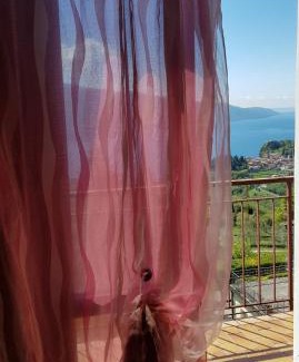 Voltino Apartment | Casa Palanca 2 balcony lake view By Garda Domus Mea