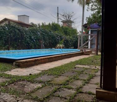 Garopaba House | Casa Rústica praia da Ferrugem próximo praia com piscina compartilhada
