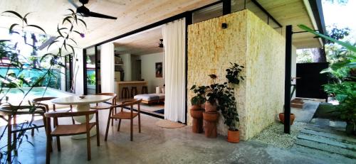 Carmen Villa | Casa Remy - Walk to the Beach and stay in a private compound! Pool, Kitchen, AC, Wi-Fi