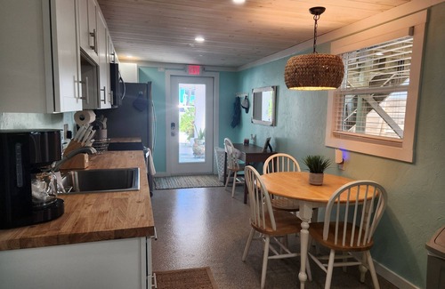 Mid Island Apartment | Casa Tranquilo Bungalow 150 steps to beach, Beach to Bay street. Dog Friendly !
