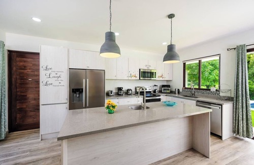 Junquillal House | Casa Tuga is a bright 4BR, 4BA home with a private pool (with kid-friendly area), Just a short walk to the beach and restaurants.