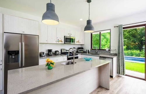 Junquillal House | Casa Tuga is a bright 4BR, 4BA home with a private pool (with kid-friendly area), Just a short walk to the beach and restaurants.