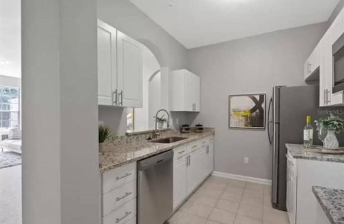 Windsor Palms Condo | CasaComfort near Disney-King Suite bedroom, FREE Amenities, and great location.