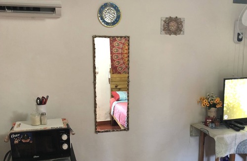 Tela Cabin | Casita de Vacaciones Para Pareja o Solteros en Residencial con Seguridad