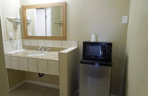 Orange Hotel | Castaway Motel