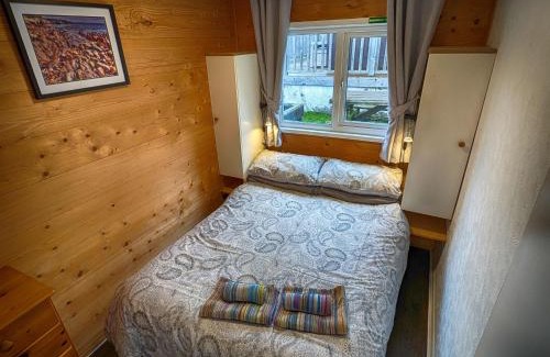 Mumbles Apartment | Caswell Beach Chalet 70 located in Gower Peninsula