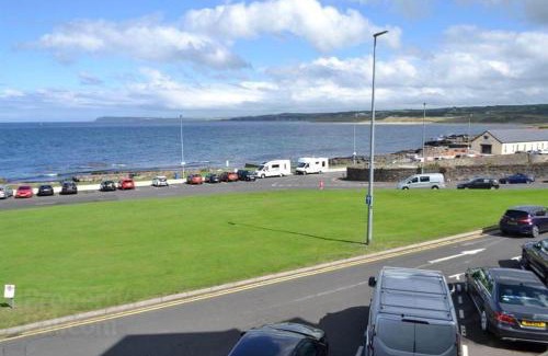 Portrush House | Causeway View perfect for large golf groups seafront central location, pet friendly, see dolphins