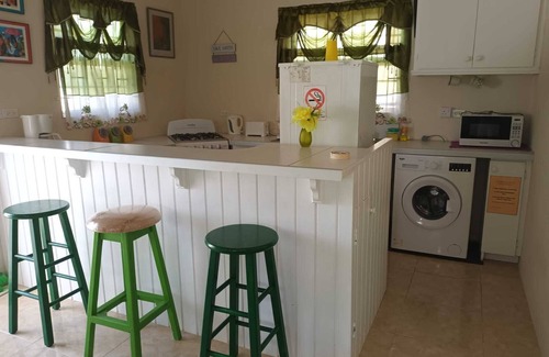 Silver Sands House | Cay Cape - Newly Build Air Conditioned Bungalow near Silver Sands Beach