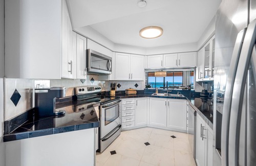 Sand Key Condo | CBC 1-19D Amazing Gulf & Intercoastal Views, Pool, Hot Tub, Gym, Sauna & Pickleball!