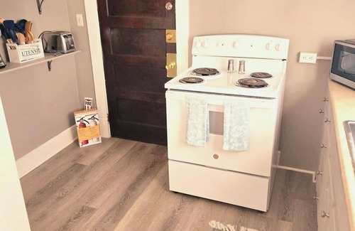 Florence House | Cedar Gray is a charming 3-bedroom located one block from historic downtown.