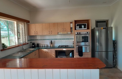Beachlands House | Central, 2 minute drive to beaches, town and hospital.