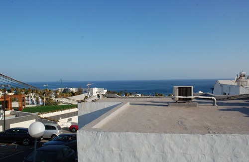 Puerto del Carmen House | Central in Puerto del Carmen near the old town with large terrace and sea view