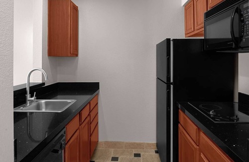 Downtown Hotel | Central Location: 1BR Suite w/Full Kitchen & Balcony - Complimentary Amenities