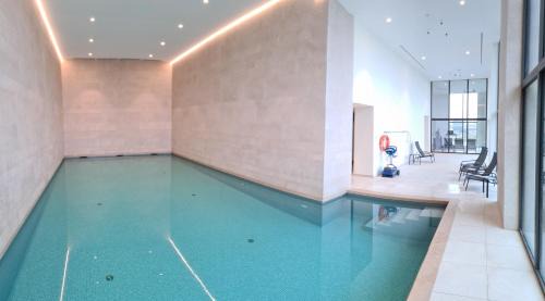 Ostend Apartment | Central Park Tower Sea View Residence with pool and gym