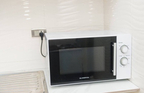 Gombe Apartment | Centralized in Gombe & accessible - 1BR Entire rental unit in Kinshasa
