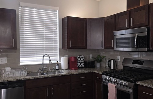 Spokane House | Centrally located Grand Bedroom for you to experience home away from home.