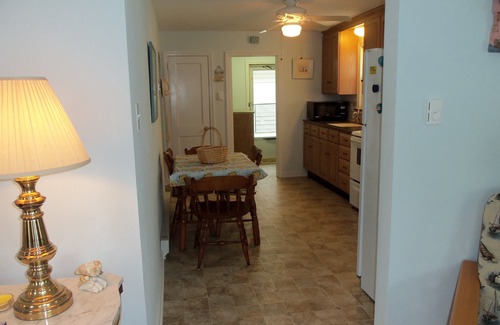 North End House | Centrally located near downtown shopping and restaurants and just a short walk to the beach and boardwalk. Large rear parking pad for 4 cars, picnic table and a fun basketball net in back too!