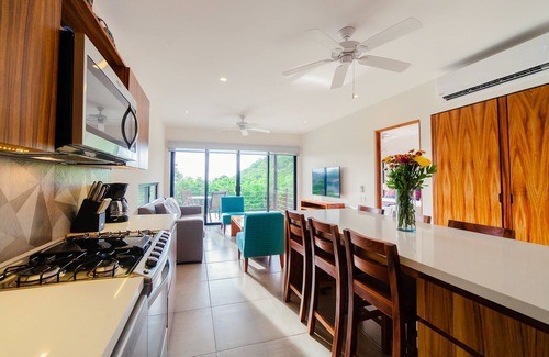 P Chahue Condo | Centrally located with private rooftop terrace with views, BBQ and shared pool.