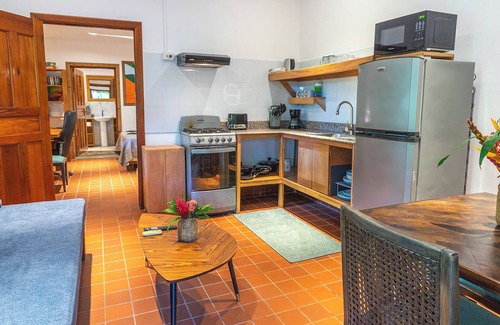 Carenero Island Apartment | Charming 1BR/1BA Garden Apartment w/AC & Jungle views near top surf spots.