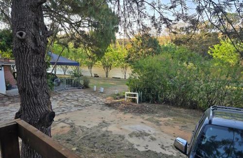 Itu House | Chalé frente para o lago - Camping Carrion