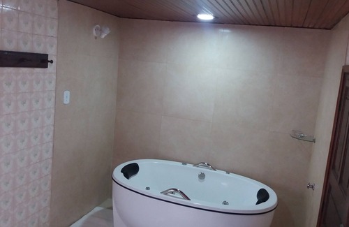 Penedo Ski Chalet | Chalé das Carpas in Penedo in front of the waterfall with full kitchen.