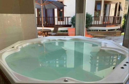 Penedo Apartment | Chale Penedo no Centro com Piscina,Hidro e Sauna !