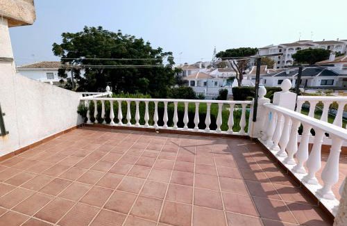 Sector O - Ostrero House | Chalet adosado en Matalascañas con piscina y chimenea, cerca de la playa