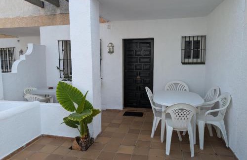 Sector O - Ostrero House | Chalet adosado en Matalascañas con piscina y chimenea, cerca de la playa