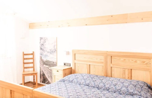 Siusi Villa | Chalet Baita, is seen at the foot of Seiser