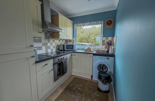 Bacton Ski Chalet | Chalet for hire at Rainbows End near a beautiful Norfolk beach ref 31039R