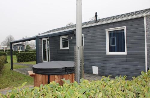 Lathum Ski Chalet | Chalet in Gelderland with Hot Tub