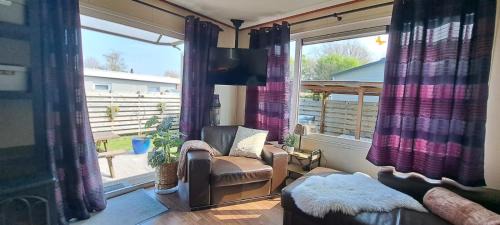 Heinkenszand Ski Chalet | Chalet met privésauna, tuin & nabij Recreatieplas VP083
