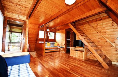 Casali del Manco Ski Chalet | Chalet Natura La terrazza sul lago