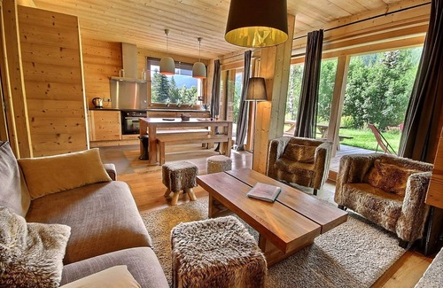 Le Serre Barbin Ski Chalet | Chalet Prestige full sun fireplace garden terrace view serrechevalierholidays