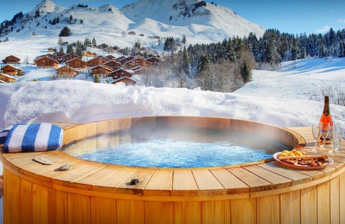Le Chinaillon Ski Chalet | Chalet Tolar - mountain holiday base, hot tub and piste view - OVO Network