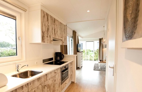 Hulshorst Ski Chalet | Chalet with dishwasher, in a holiday park