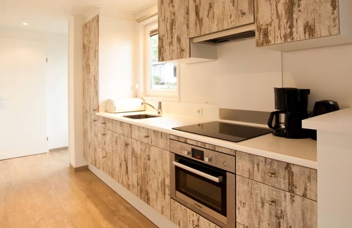 Hulshorst Ski Chalet | Chalet with dishwasher, in a holiday park